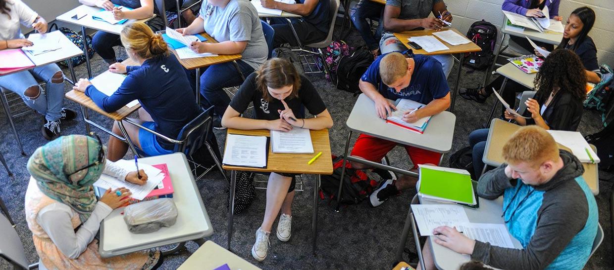 Students studying in a circle 